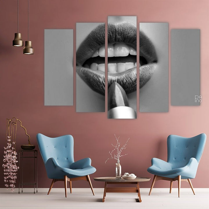 Woman applying lipstick