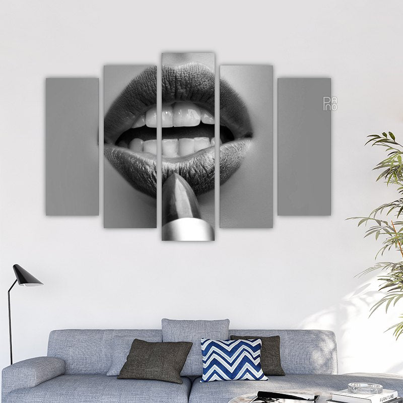 Woman applying lipstick