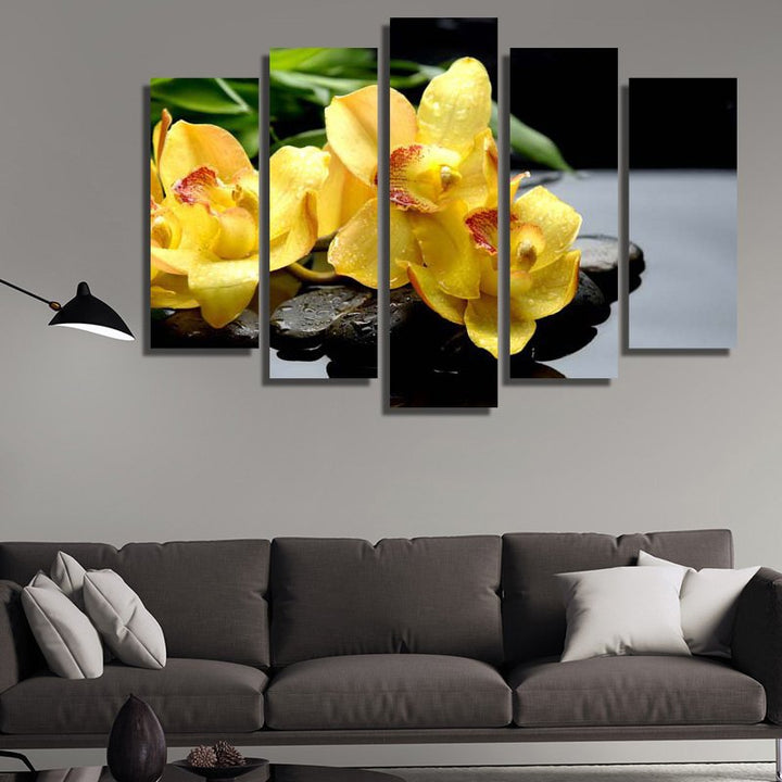 Yellow flowers on zen stones
