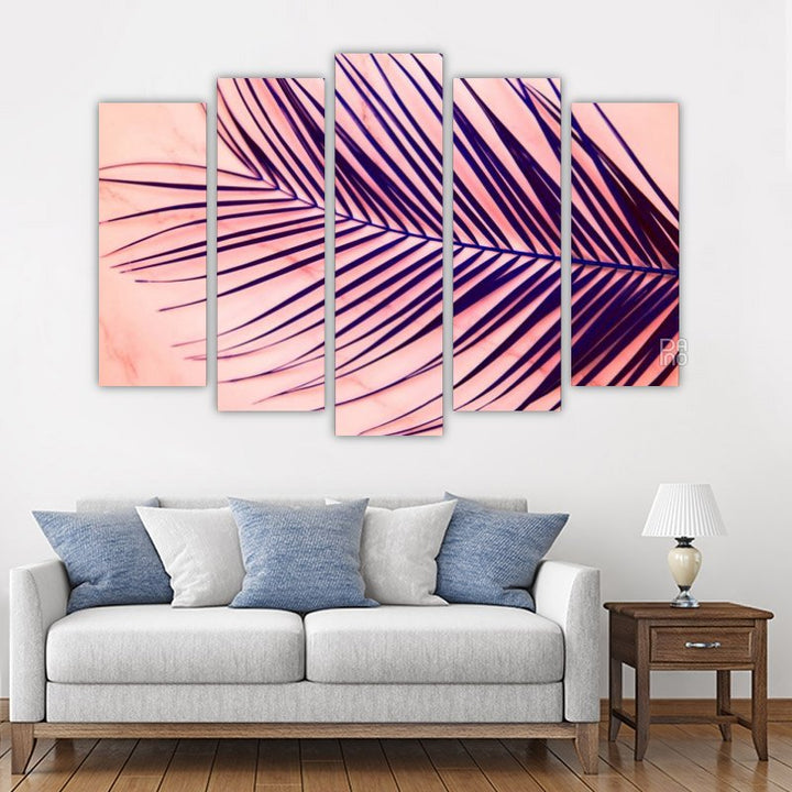 Palm leaves on a pink background