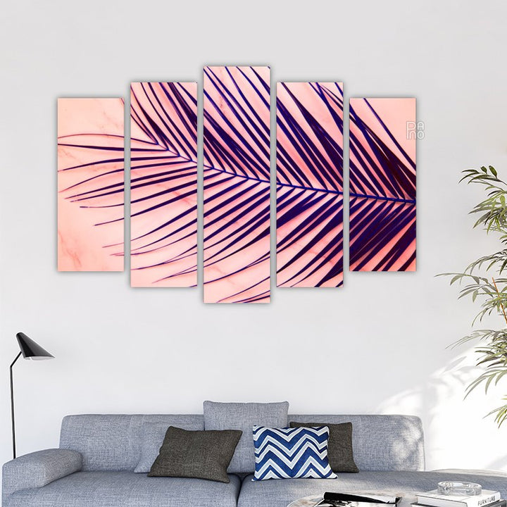 Palm leaves on a pink background