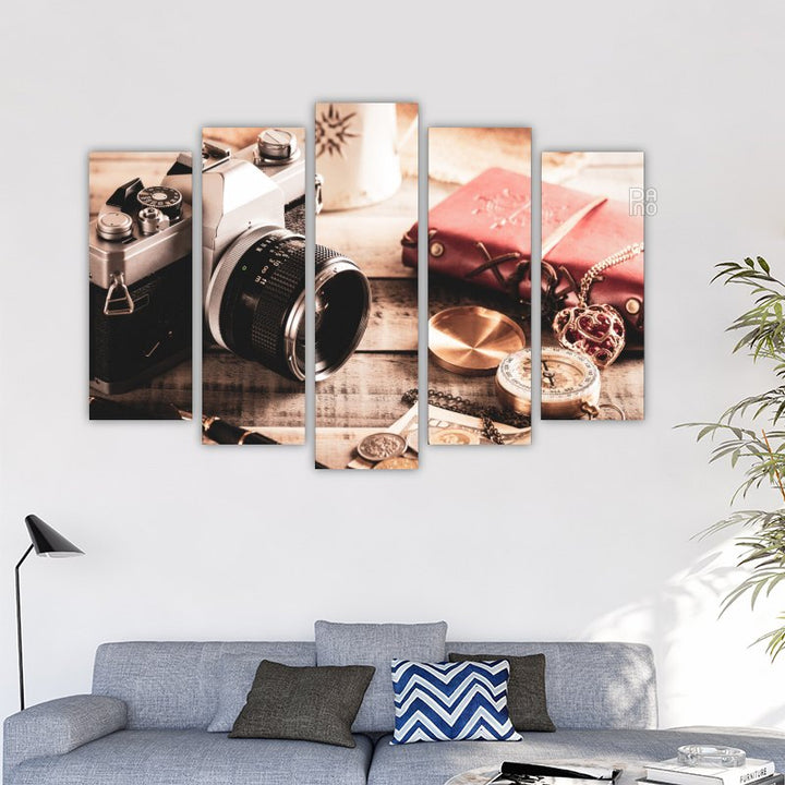 Camera on Wooden Background