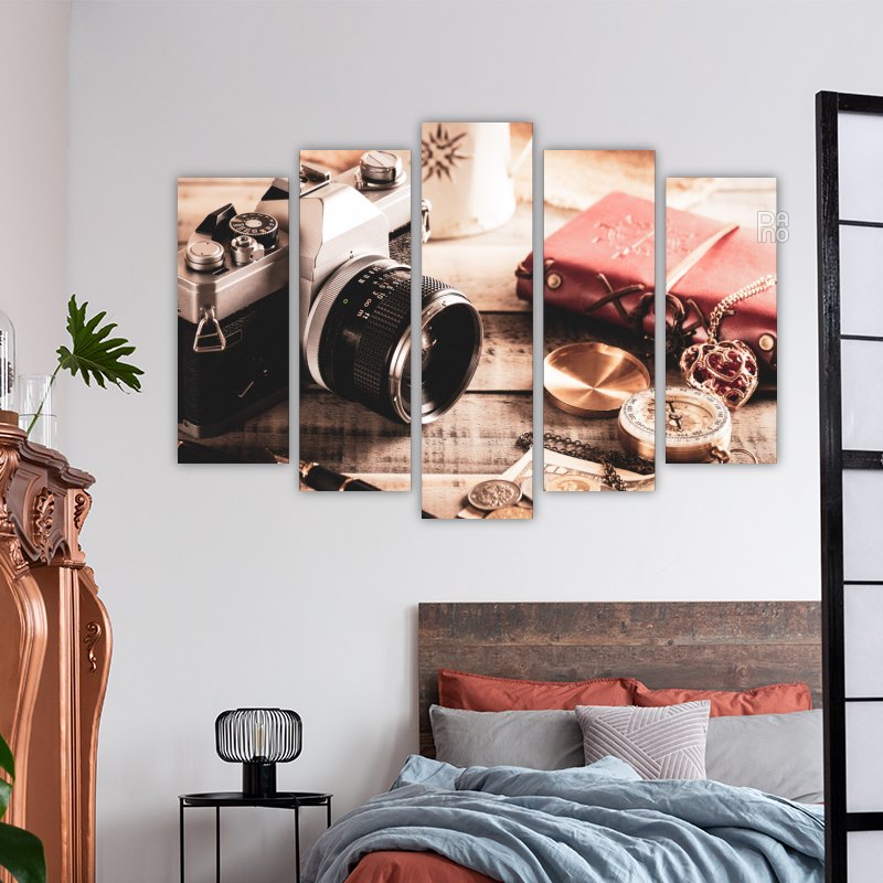 Camera on Wooden Background