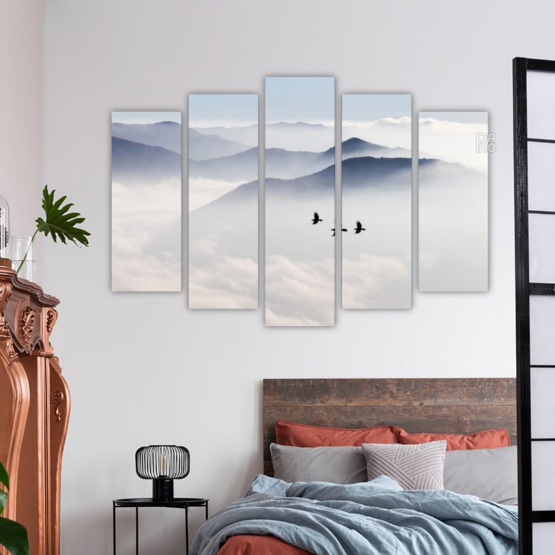 Silhouettes of mountains and birds