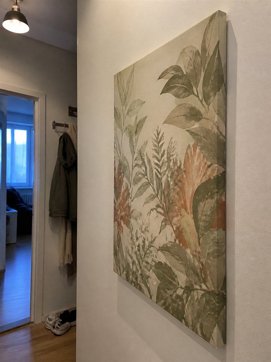 Illustrativt kundebillede af et opspændt lærred i et hjem